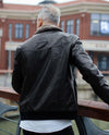 Fur collar leather jacket with embossed icon